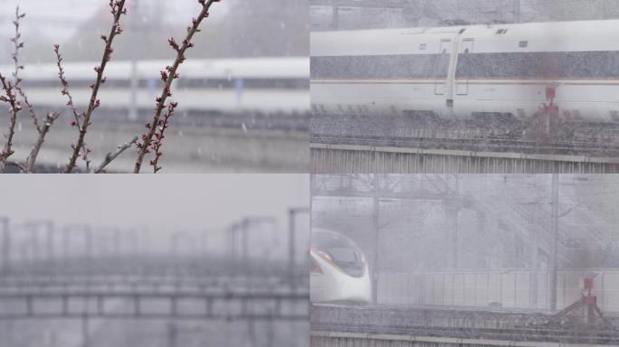 雪中高铁和谐号，下雪火车站，北京春雪