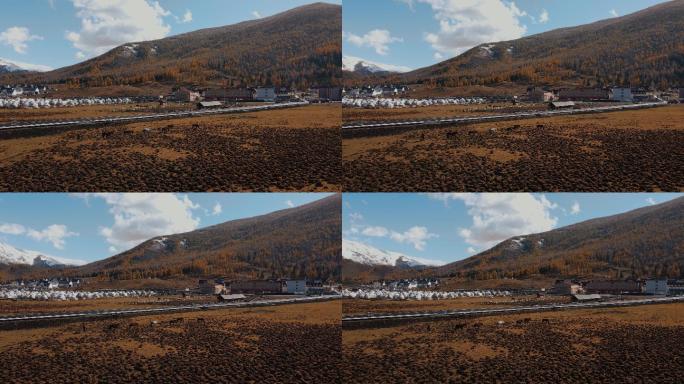 新疆喀纳斯秋季金秋小雪航拍4K素材1