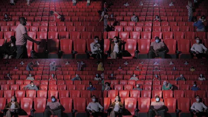 戴着口罩的观众在电影院就座