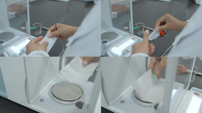 实验室视频白衣科研人员称重滤纸特写