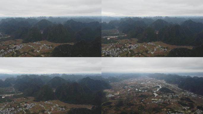 航拍群山脚下山村田野唯美空镜头