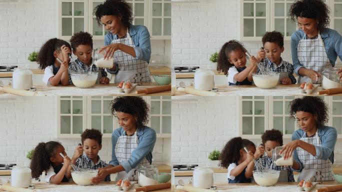 年轻的母亲教幼儿烹饪