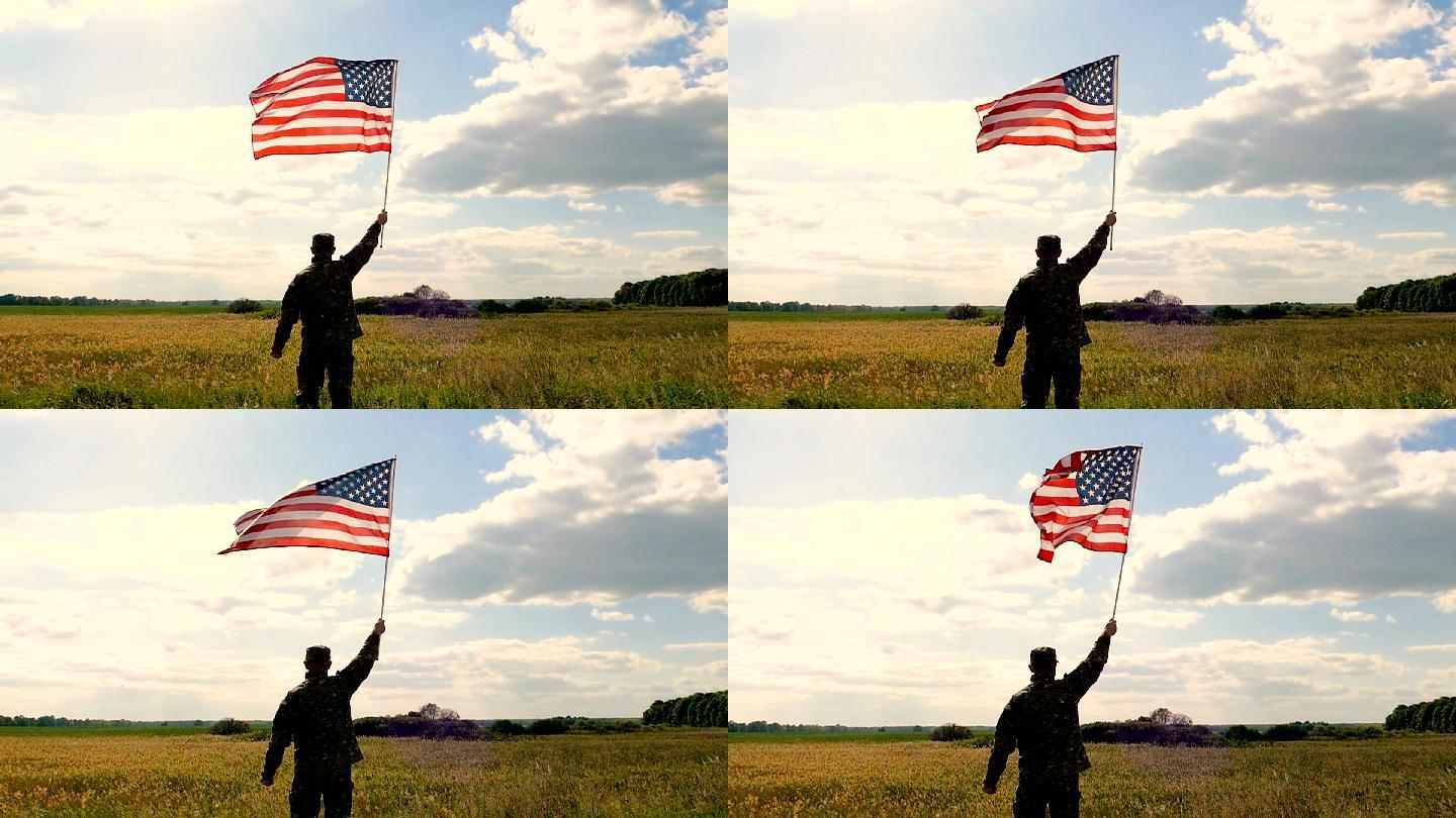 士兵举着美国国旗美利坚
