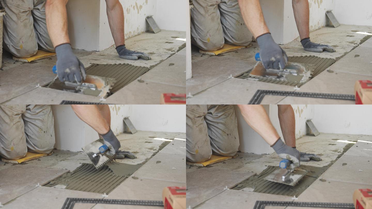 抹子建筑工人安装铺设地板刮刀