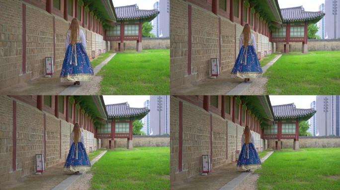 身穿韩服的年轻女子参观韩国首尔的宫殿