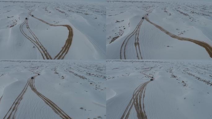 穿越沙漠雪地的越野车