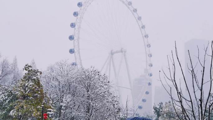 大降温下雪雪景倒春寒降温城市雪景