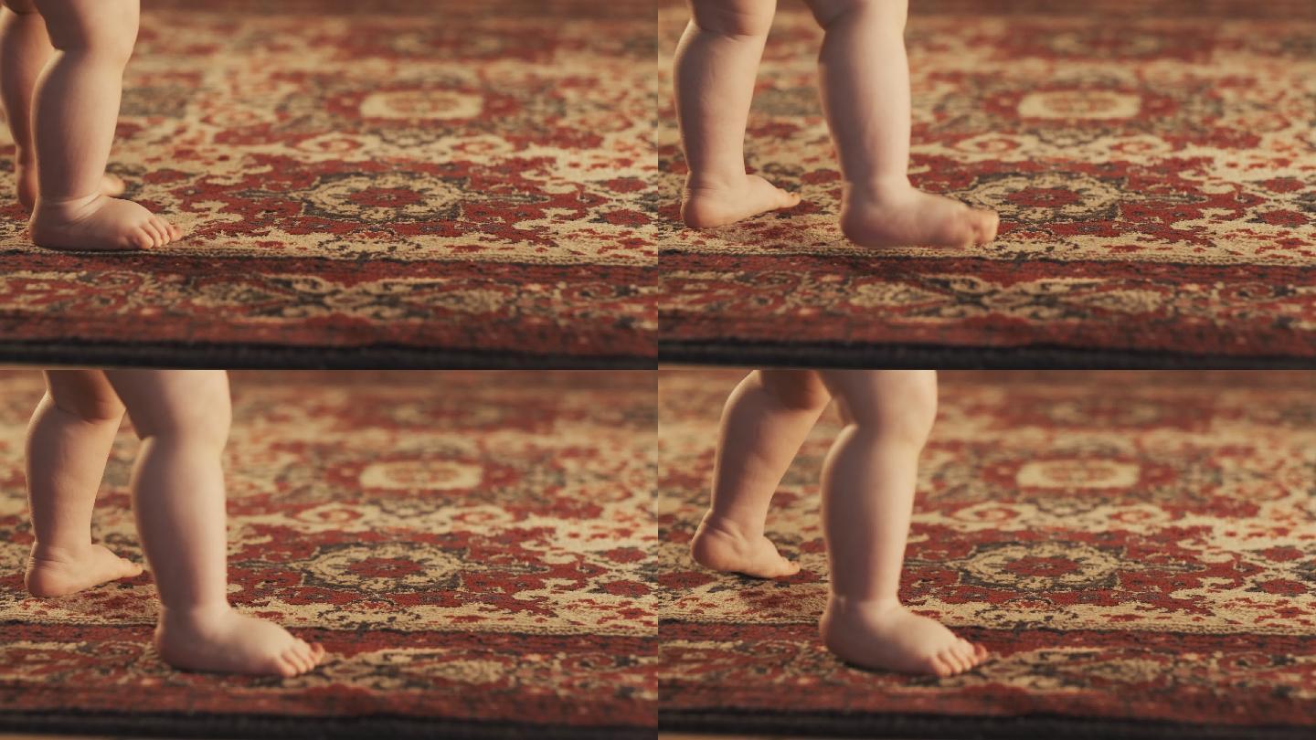 宝宝赤脚走路。婴儿蹒跚学步脚部特写