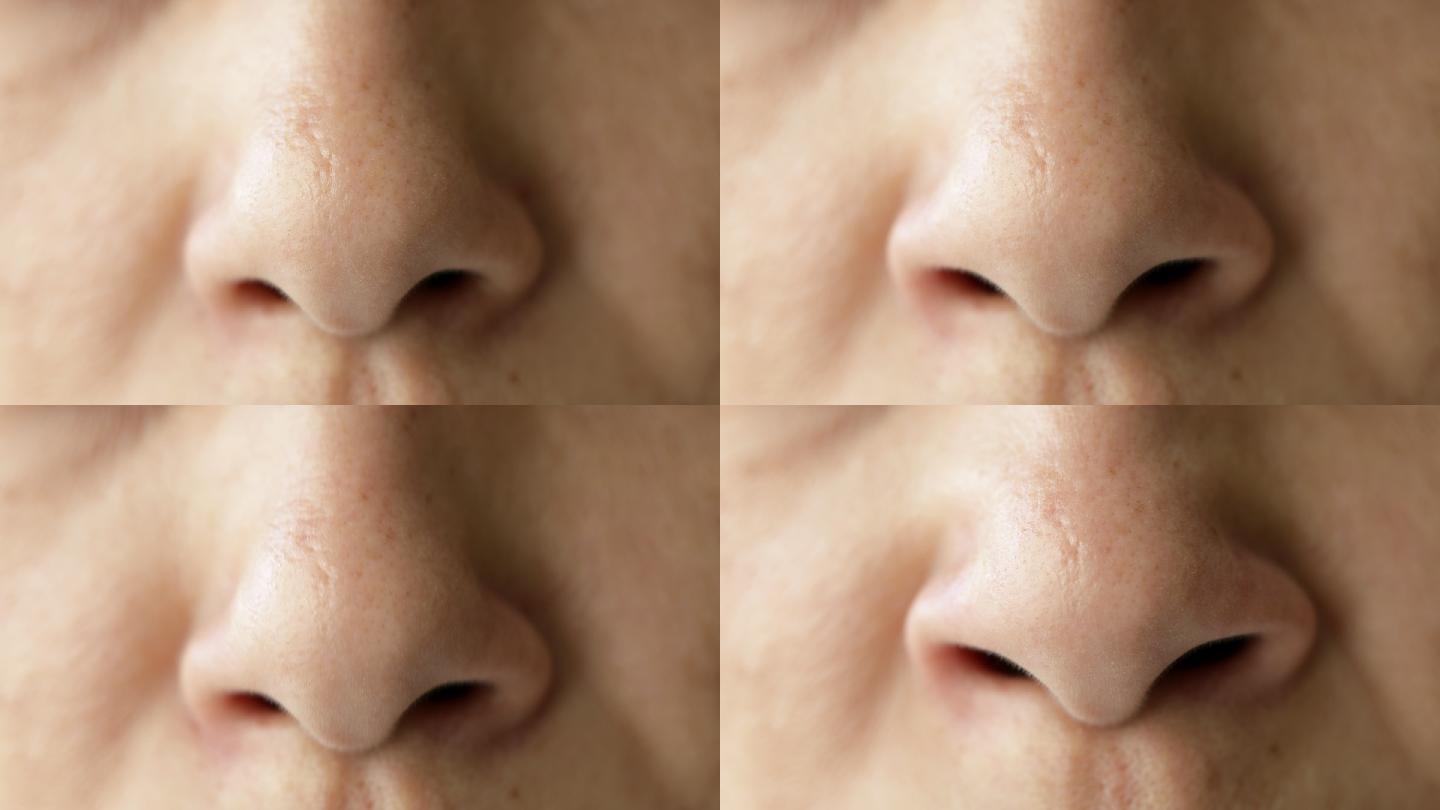 一个女人用鼻子四处嗅的特写镜头