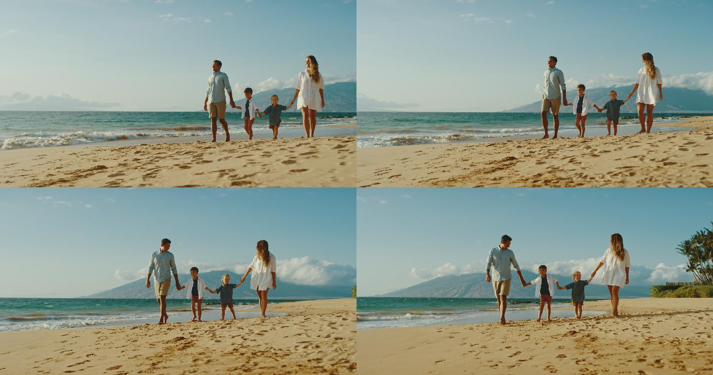 海边散步的一家人幸福一家四口海滩散步美好