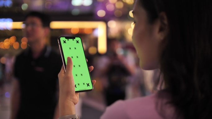 绿色屏幕的手机手机APP科技应用购物消费