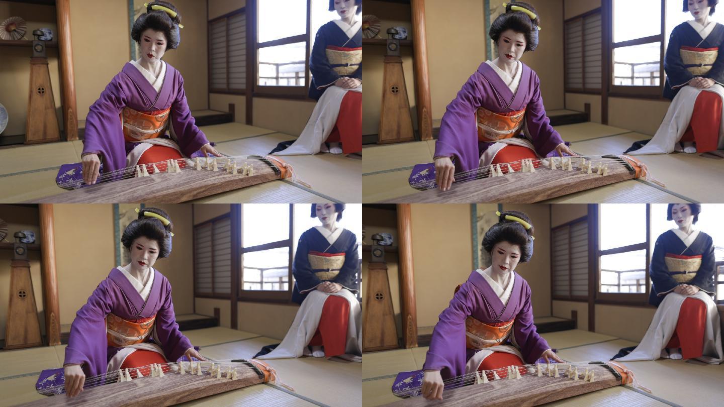 艺妓在日本榻榻米房弹琴