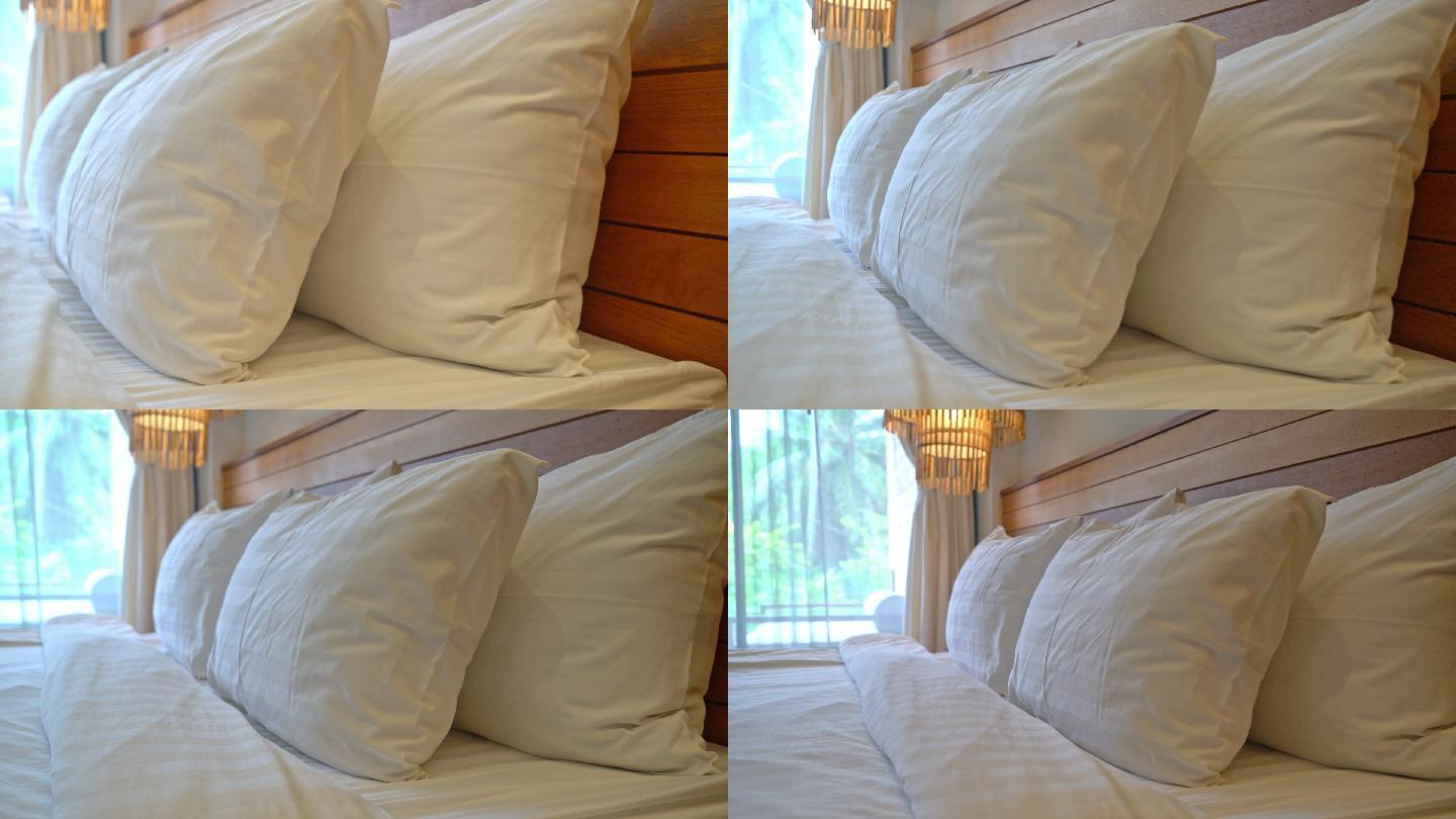 卧室内部床上的白色枕头