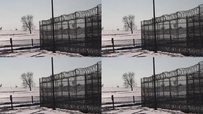 监狱围栏和铁丝网监牢牢狱关押囚犯犯人