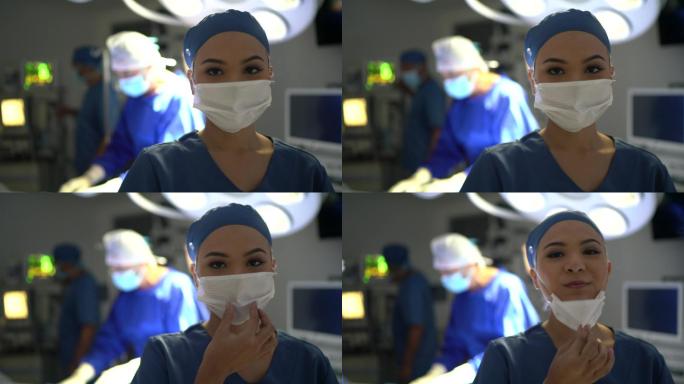 年轻医护人员在手术室摘下口罩并微笑