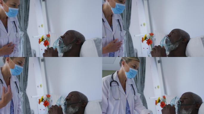 患者在医院病床上戴着氧气面罩与医生交谈
