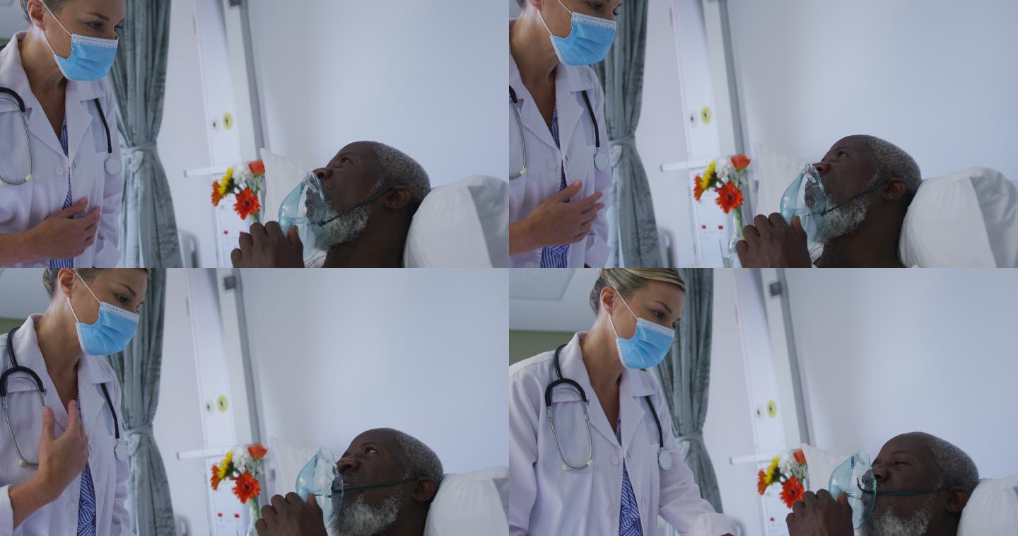 患者在医院病床上戴着氧气面罩与医生交谈