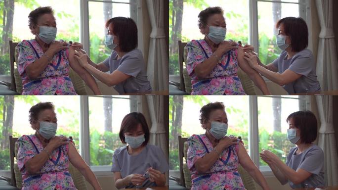 护士在家为老年人注射疫苗