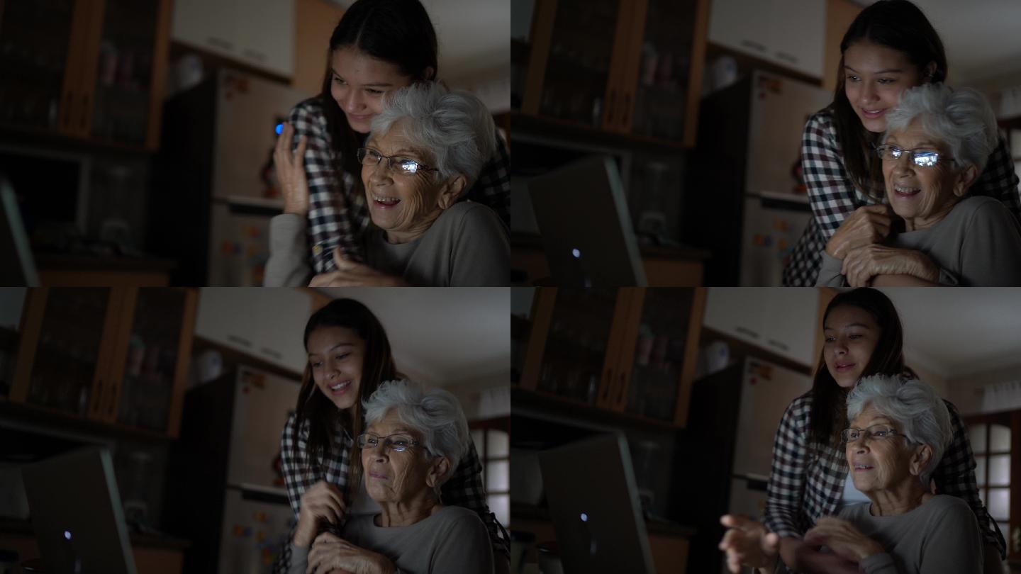 孙女和奶奶一起视频聊天，飞吻