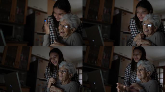 孙女和奶奶一起视频聊天，飞吻
