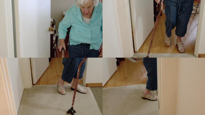 老妇人拄着拐杖慢慢地穿过她家