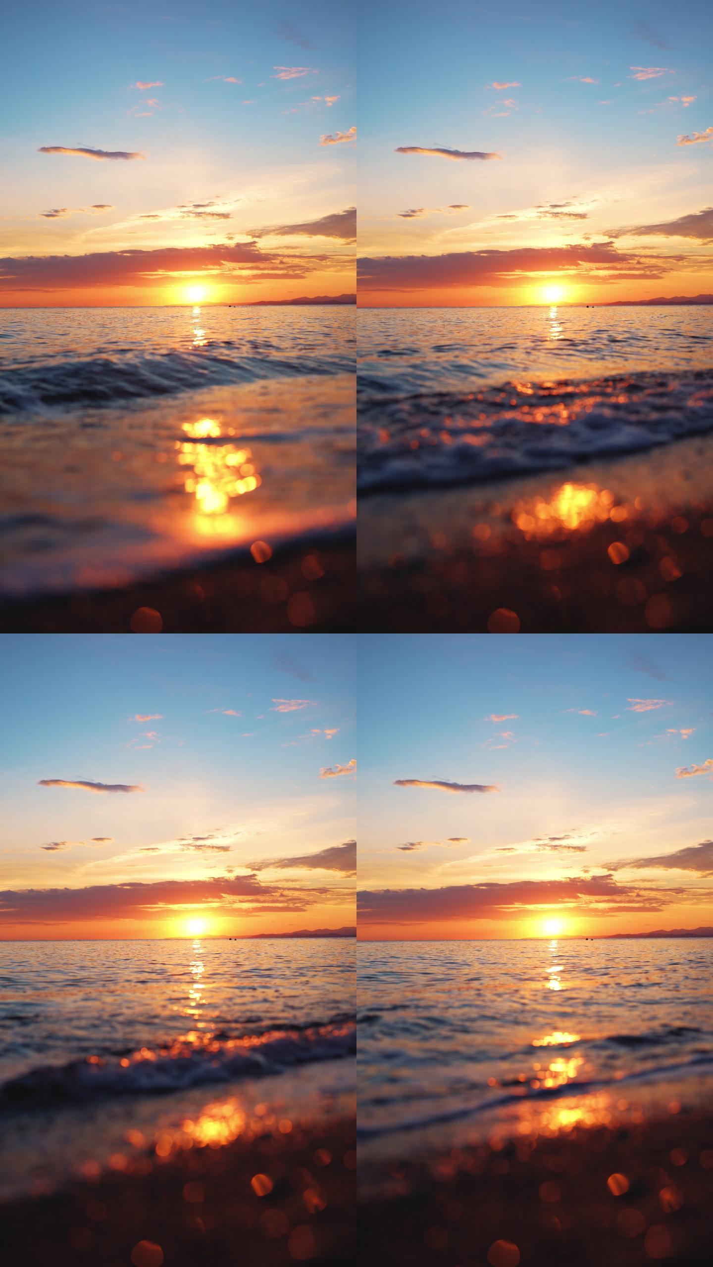 海上落日与波涛竖屏竖版手机拍摄海边海岸