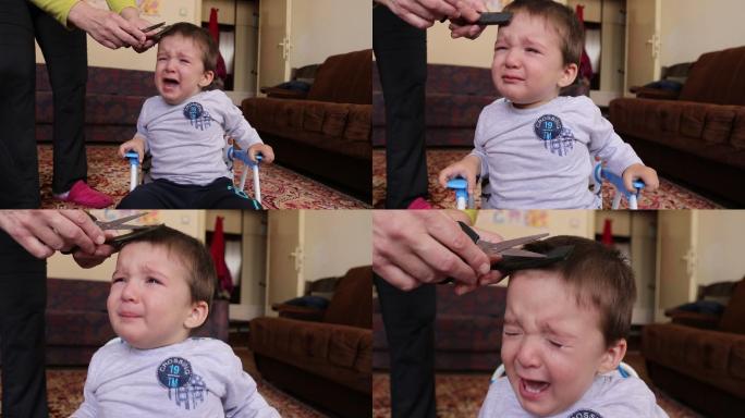 当他的祖母在家给他理发时，小男孩哭了