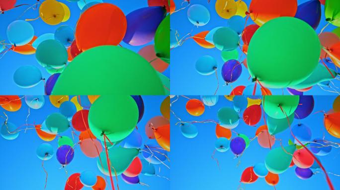 许多五颜六色的气球飞向蓝天