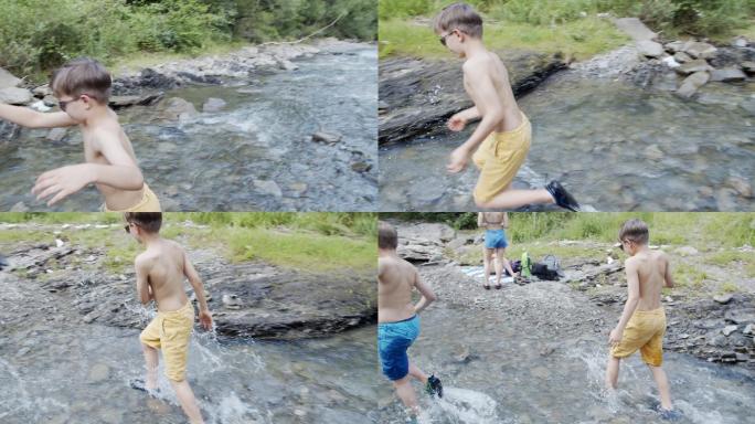 小溪边玩耍的孩子野泳戏水溪水