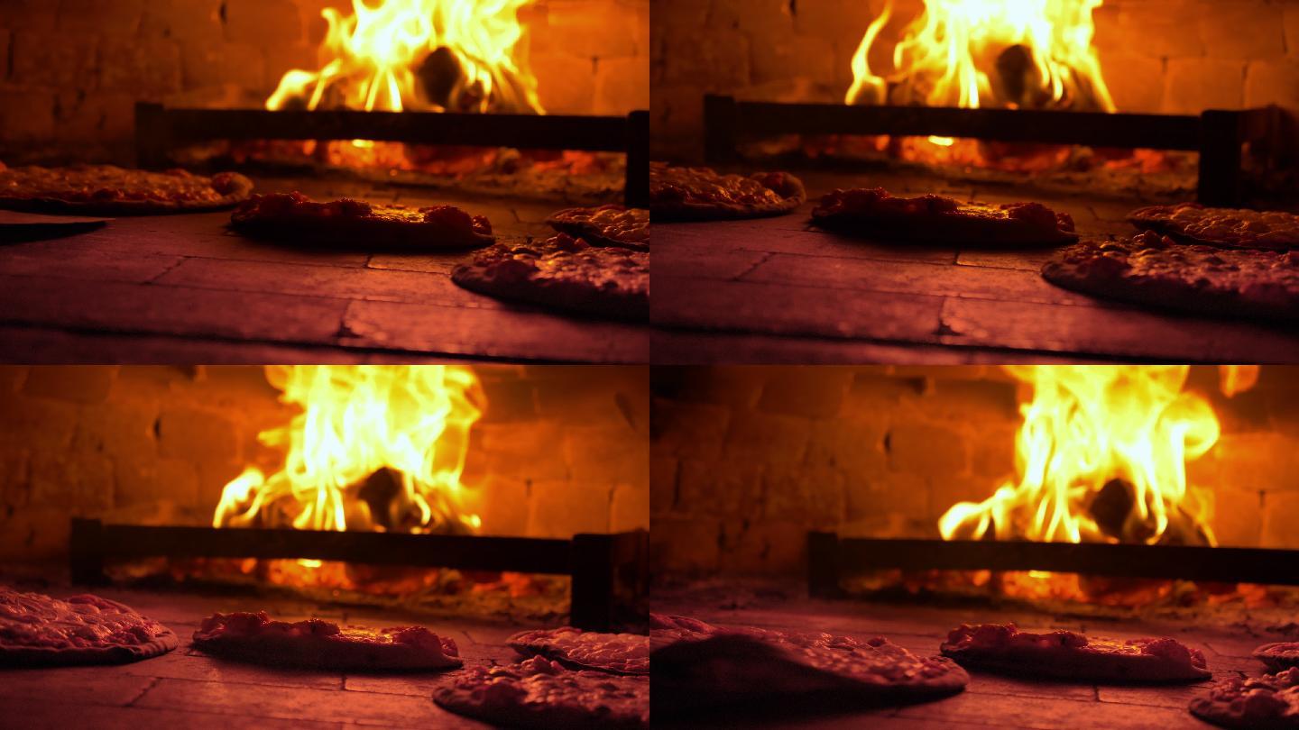 在木柴烤箱中烤披萨