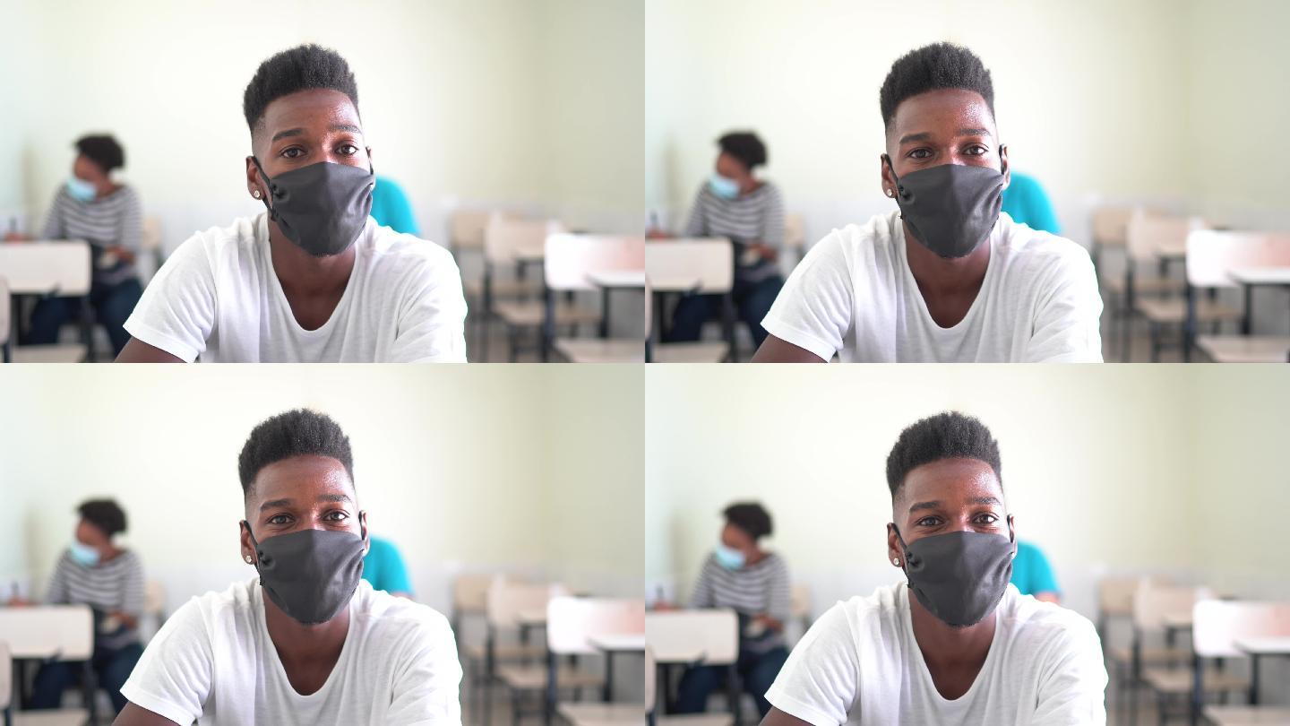 教室里戴着口罩的学生