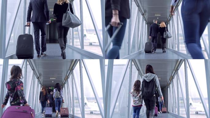 机场携带行李乘客的后视图