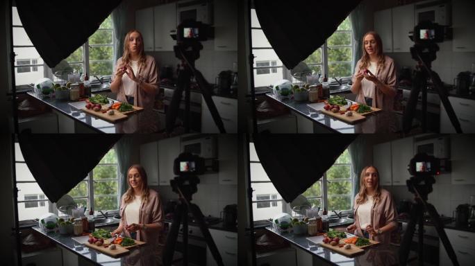 美食博主在厨房录制烹饪食谱的视频片段