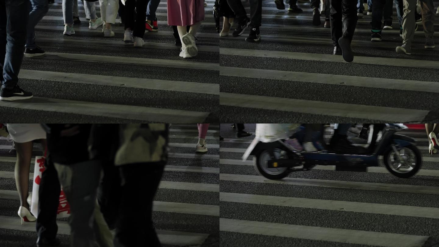 夜晚行人穿过人行道脚步特写升格1