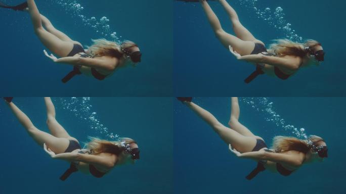 美女自由潜水潜泳女人大胸性感海底水中