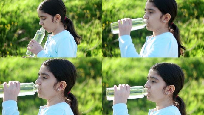 小女孩正在喝水矿泉水纯净水净化水国外女生