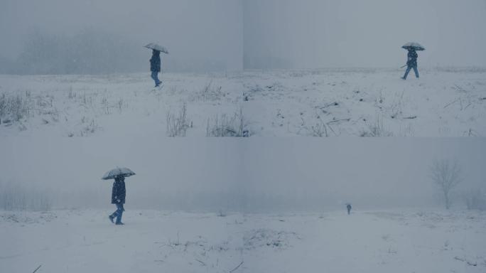 人在下雪天孤独的行走，旷野，空境