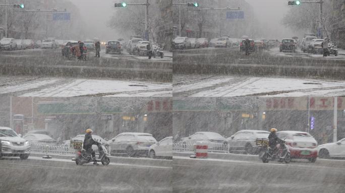 城市冬季下大雪车辆和行人放慢行走速度