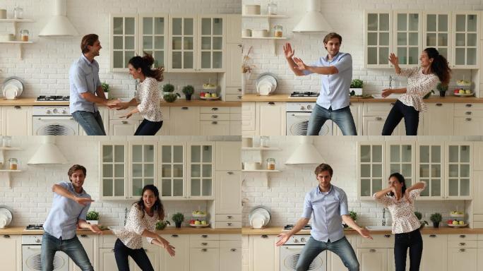 情绪激动的年轻夫妇在厨房跳舞