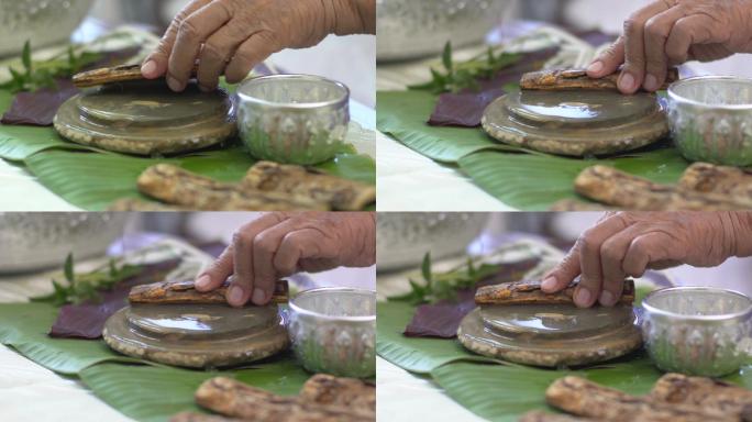 塔纳卡草本树皮特写镜头草本精华研磨摩擦