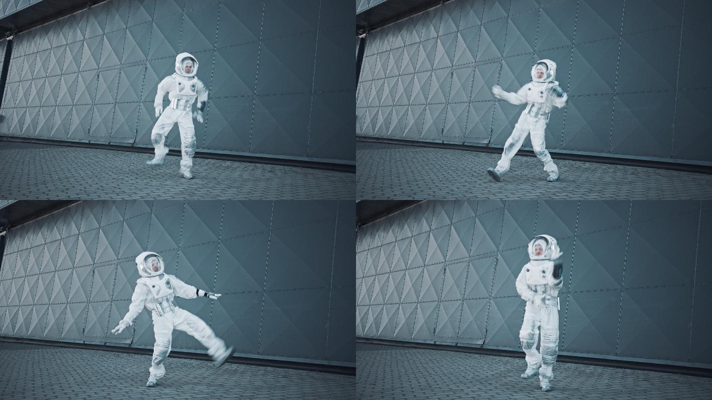 穿着宇航服的帅哥在金属墙边跳舞