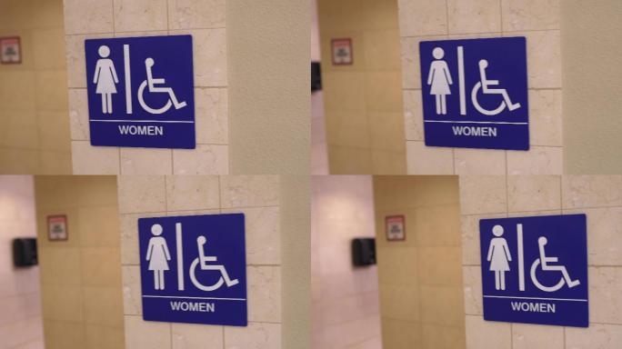 蓝色女厕和残疾人标志