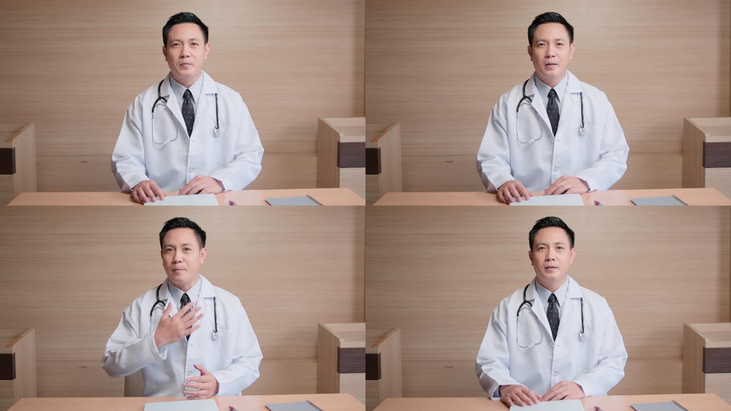 男医生在线视频通话远程与患者交谈。