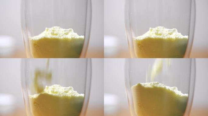 玻璃杯倒入撒落冲泡成人婴幼儿营养绿色奶粉