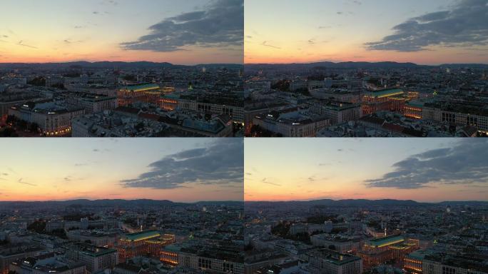 日落时间照明飞越维也纳市中心歌剧院