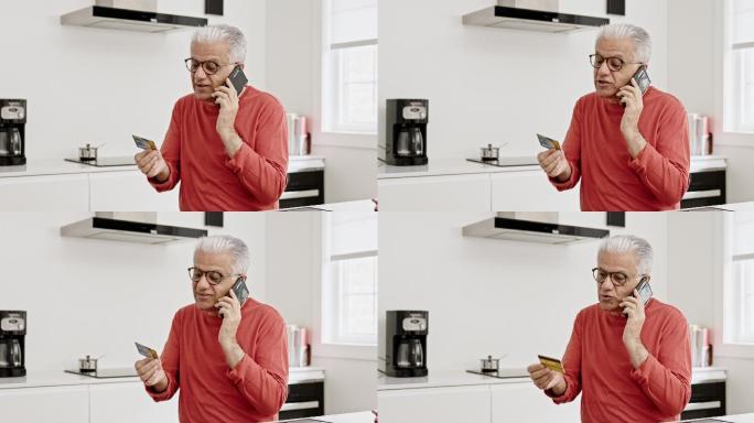 老年人在打电话白发老人沟通交流银行卡