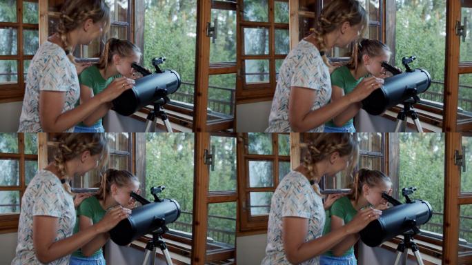 母女用望远镜观察大自然