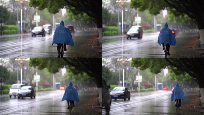 江南浙江春雨雨天城市道路自行车雨衣背影