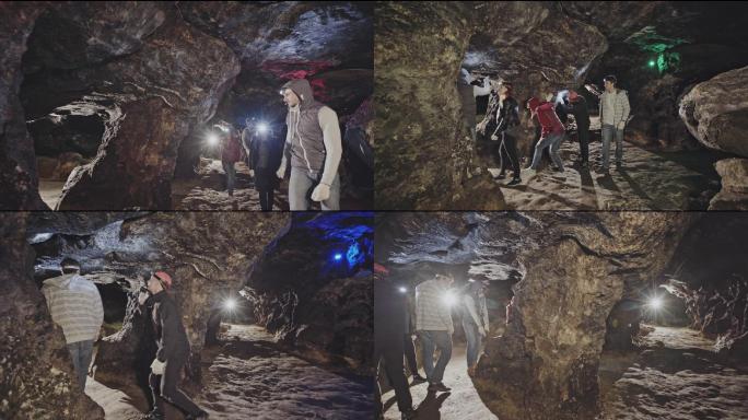 导游带领游客进入地下隧道