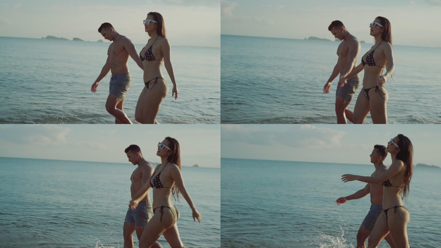 一对浪漫的情侣在海滩上